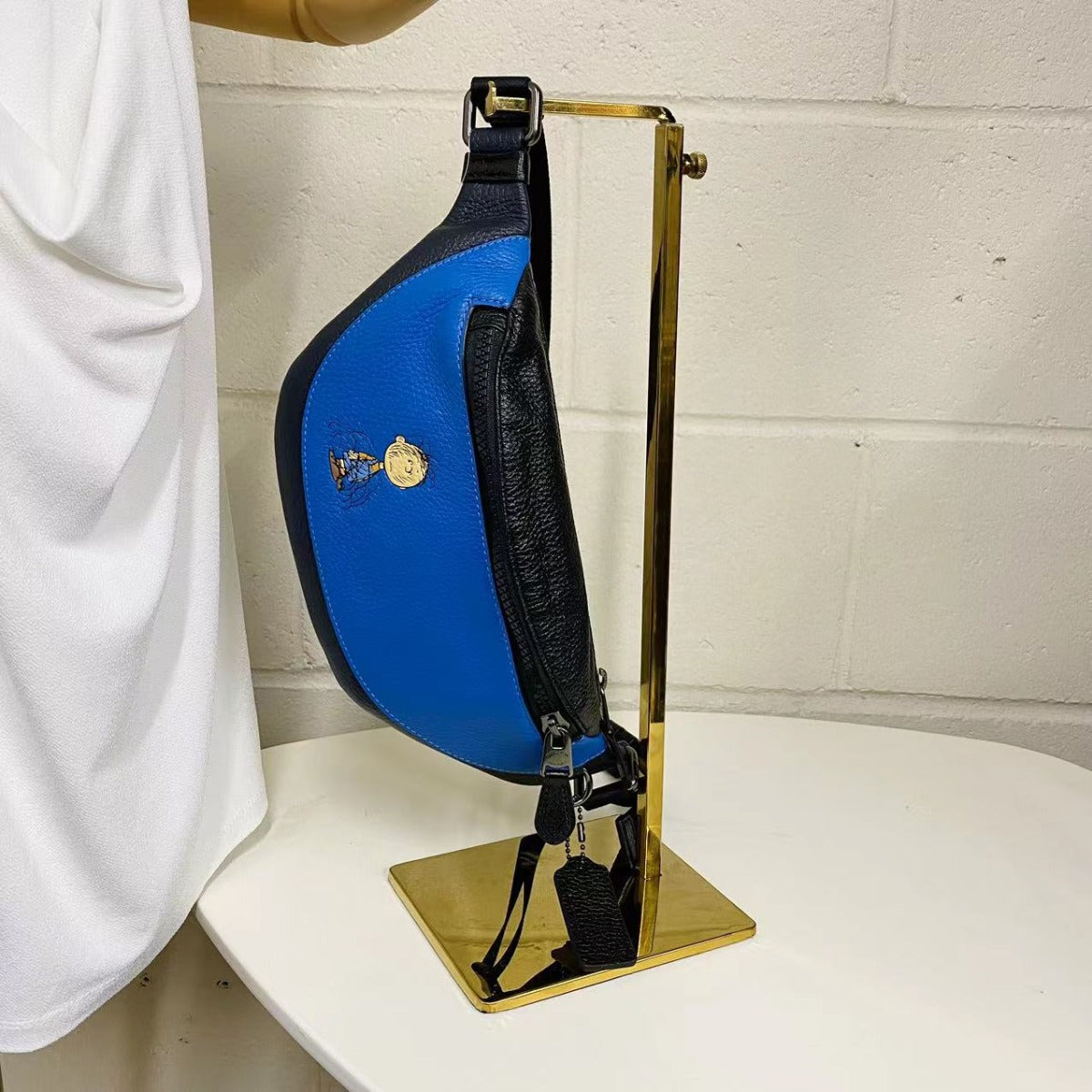 Coach 5512 X Peanuts Mini Warren Belt Bag With Pig Pen In Vivid Blue Coach 5512 X Peanuts Mini Warren Belt Bag With Pig Pen In Vivid Blue